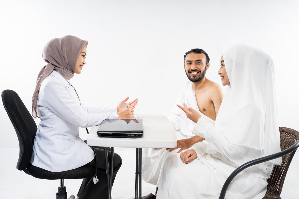 Couples of Prospective Hajj Pilgrims Chatting with Doctors before Umrah